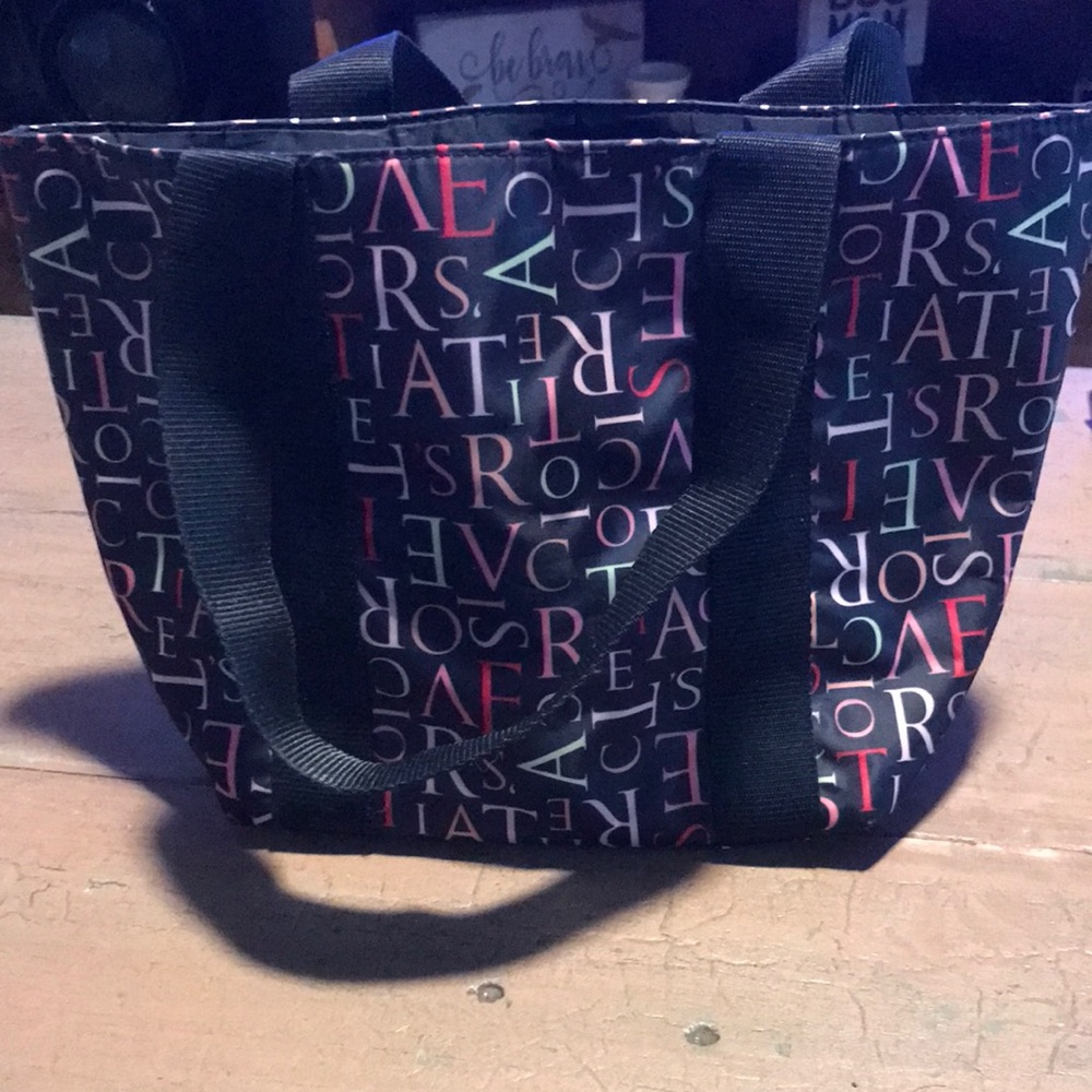 Cute medium sized Victoria secret purse .